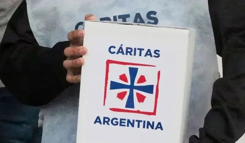 Voluntarios de Cáritas recorren los barrios para impulsar la colecta solidaria.
